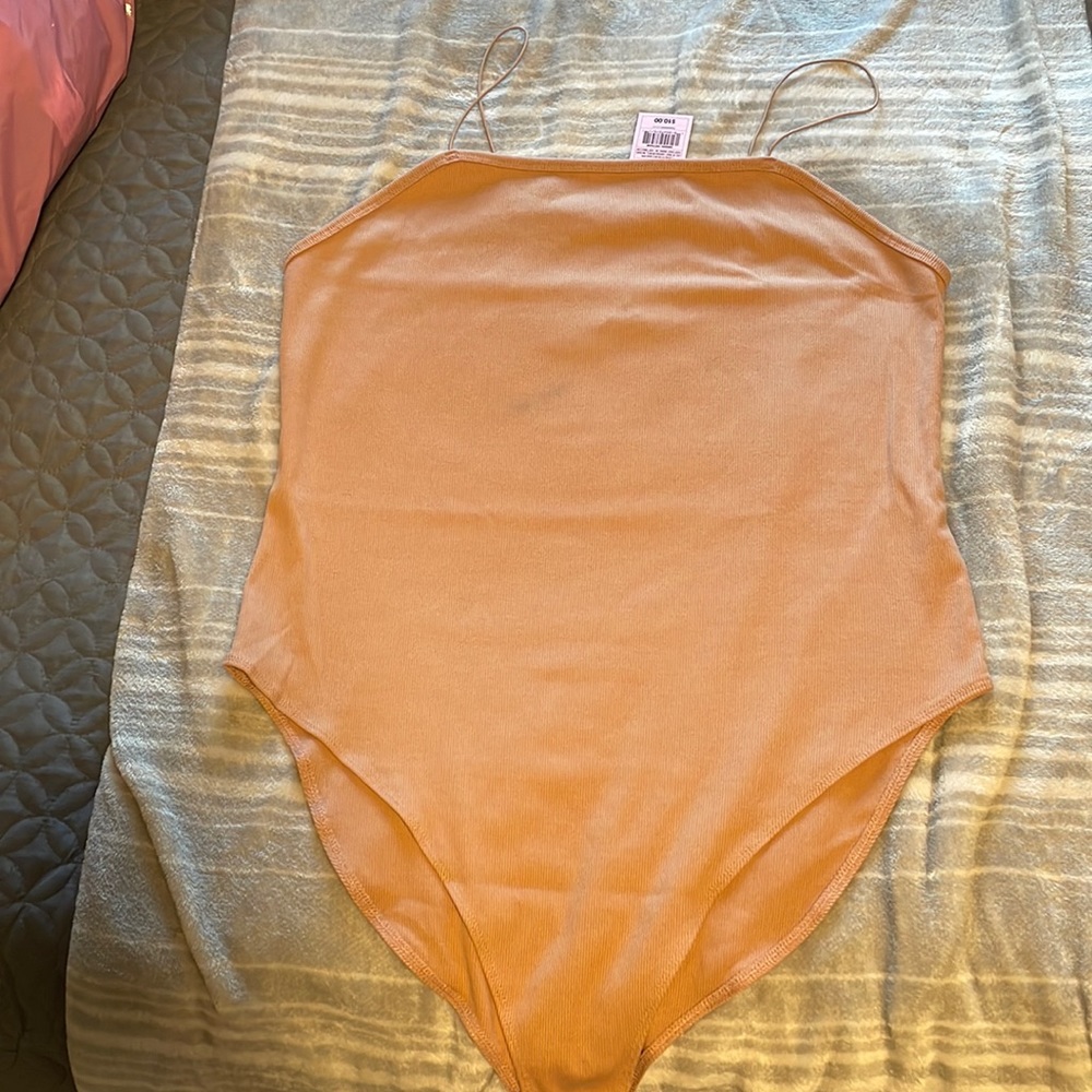 Brand new nude body suit